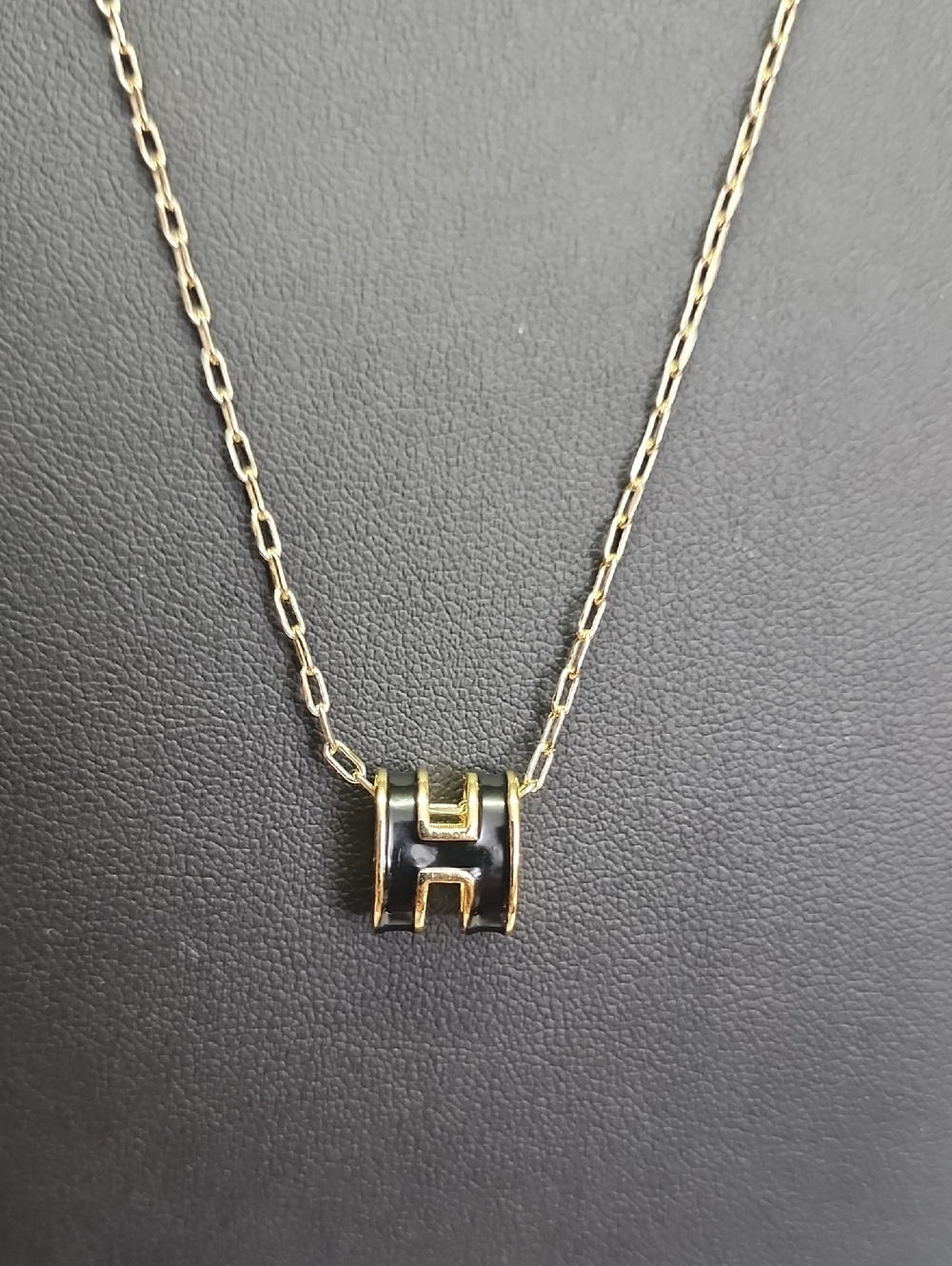 Black and Gold Sliding H charm Necklace